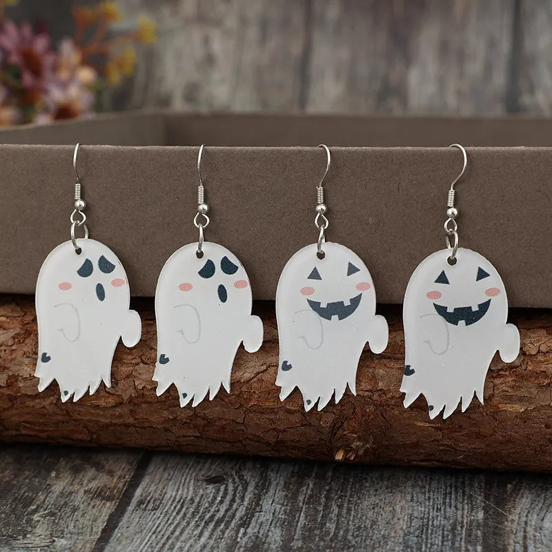 White acrylic dangle earrings with spooky ghost designs and alloy hooks.