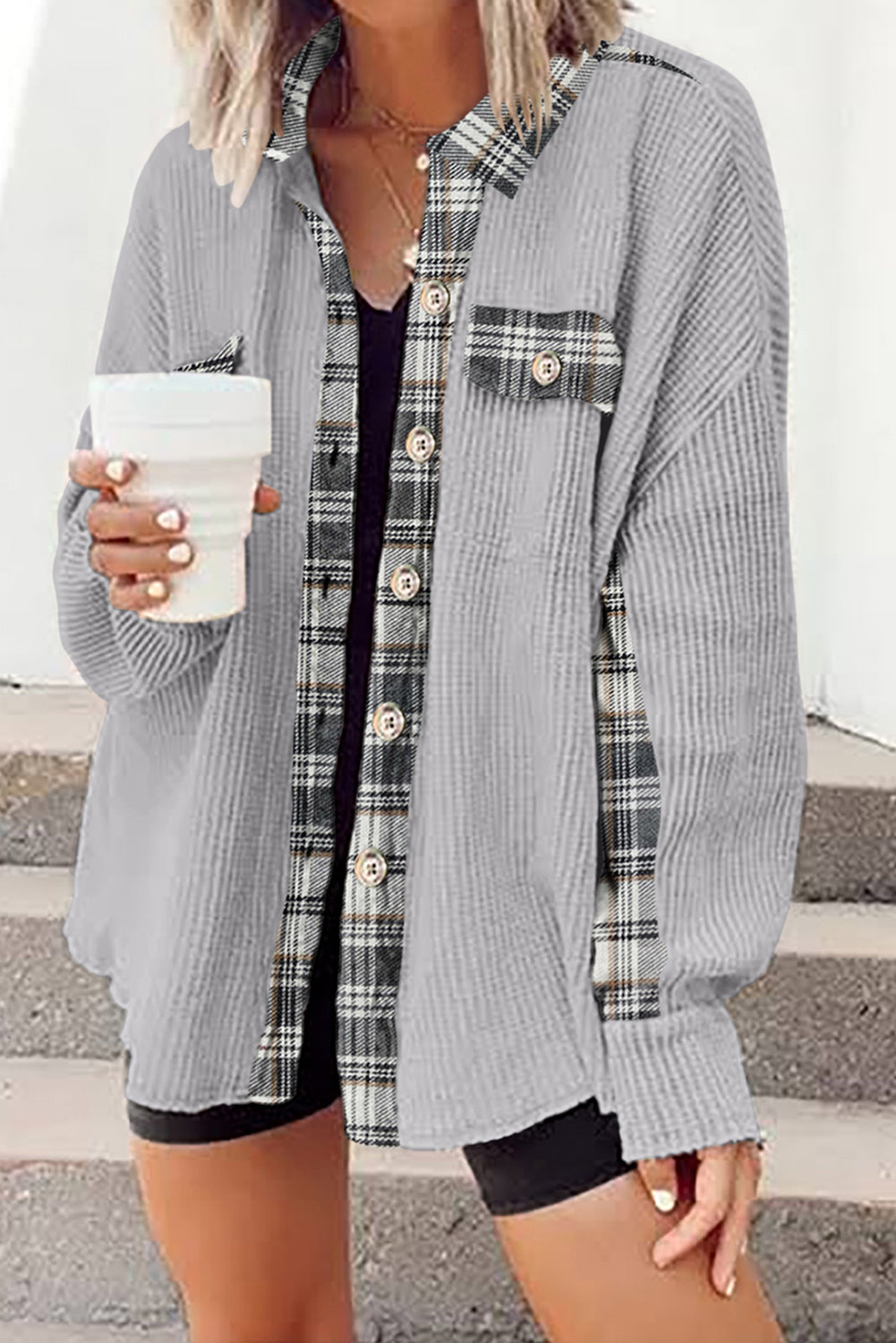 Light Gray waffle knit overshirt with plaid trim and button front, worn open over a black tank top.