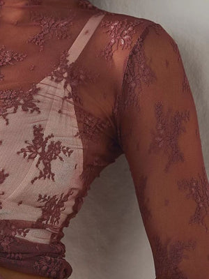 Burgundy floral lace illusion mock neck long sleeve blouse with sheer sleeves.
