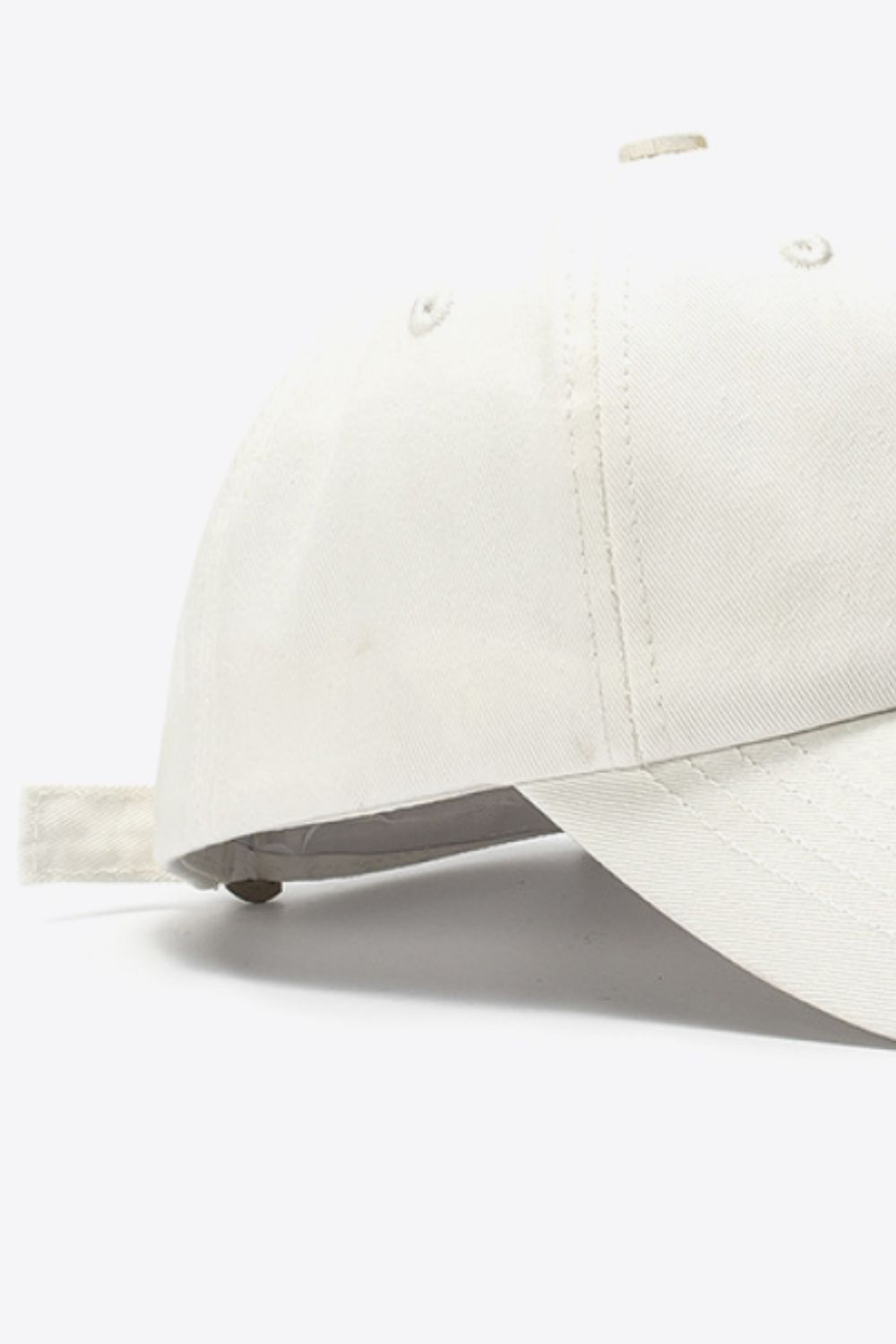 Beige cotton baseball cap with adjustable strap detail