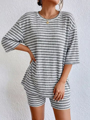 Gray striped two-piece set with elbow sleeve top and shorts.