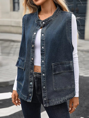 Washed black denim vest with band collar, button front, and two chest pockets.