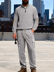Men's gray two-piece set with quarter-zip pullover and cargo pants, featuring elbow patches.