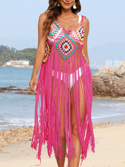Crochet patchwork cover-up dress in hot pink with colorful diamond pattern and long fringe detail.