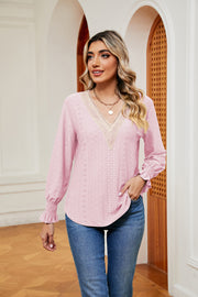Blush pink eyelet blouse with lace trim V-neck and ruffle cuffs