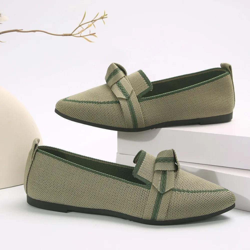 Olive knit bow loafers with pointed toe and contrast trim.