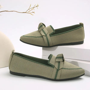 Olive knit bow loafers with pointed toe and contrast trim.