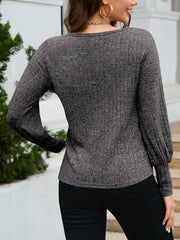 Charcoal scoop neck knit sweater with balloon sleeves and ribbed texture.