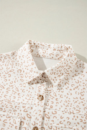 Leopard print overshirt with patch pockets, collared button-down shirt in leopard pattern.
