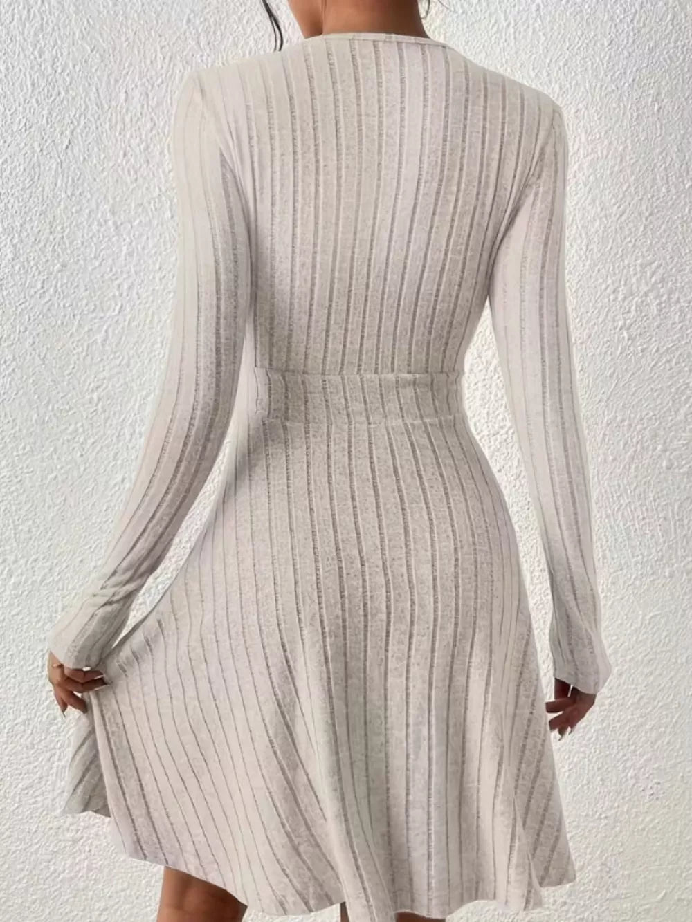 Light Gray ribbed wrap mini dress with long sleeves and A-line skirt.