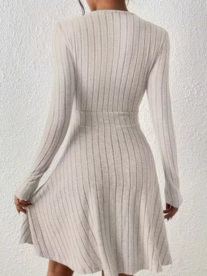 Light Gray ribbed wrap mini dress with long sleeves and A-line skirt.