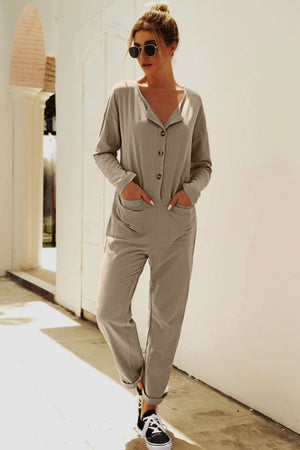 Relaxed linen-blend jumpsuit in khaki with button-down front and cuffed legs