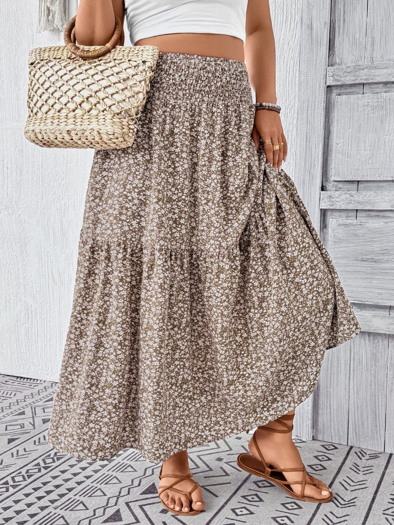 Tiered maxi skirt in mocha with a ditsy floral print and smocked waist