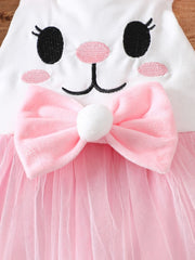 White baby one-piece with embroidered bunny face, pink bow, and pink tulle skirt.