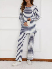Blue striped knit two-piece set with flared pants and a long-sleeve top.