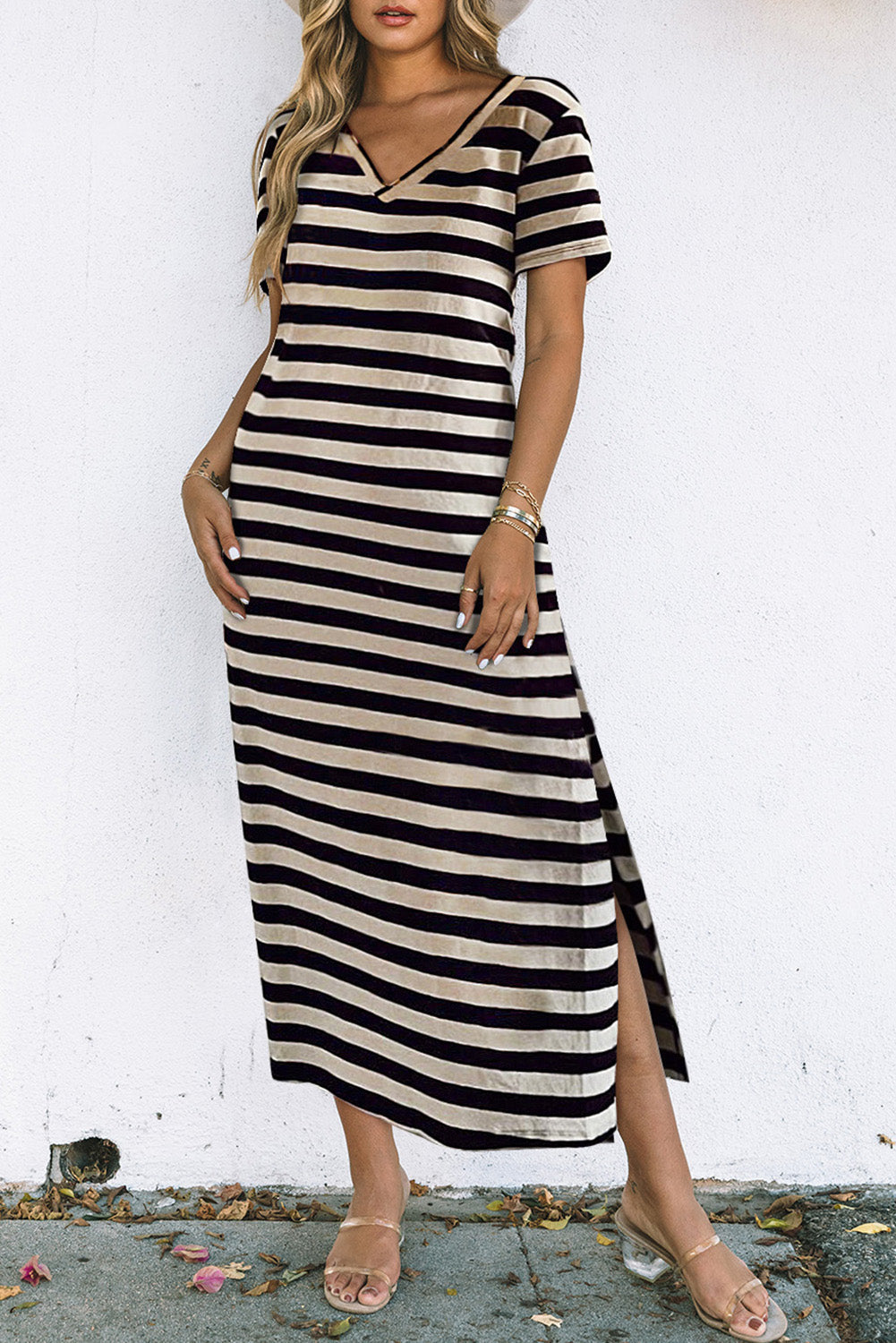 Striped jersey maxi dress with V-neck, short sleeves, and a high slit hem.