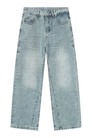 Baggy denim jeans in medium wash with subtle fading and a wide leg.