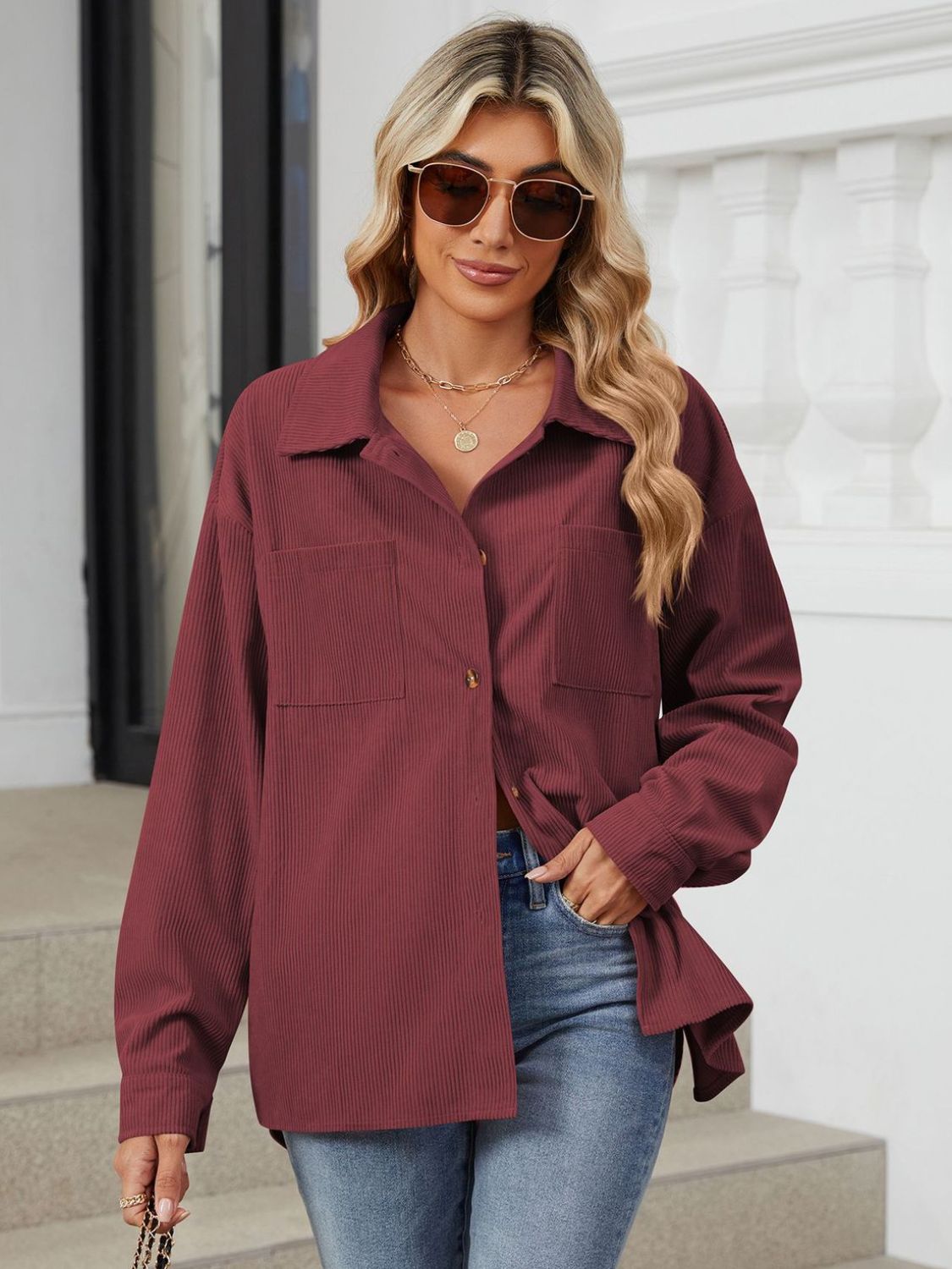 Burgundy corduroy overshirt with patch pockets and button front.