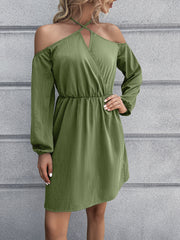 Cross-strap off-shoulder mini dress in Matcha Green with long sleeves and elastic waist.