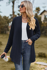Dark blue textured open-front drape cardigan with a relaxed fit and long sleeves.