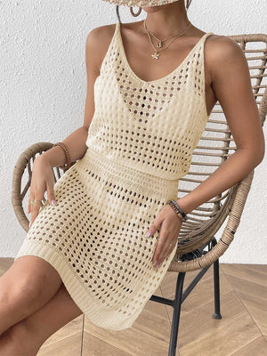 Beige openwork V-neck cover-up dress with spaghetti straps and a mini length.