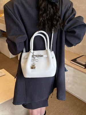 Leather Crossbody Bag With Lock Detail in White, model styling view