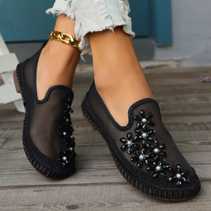 Round Toe Slip-ons in Black, close-up detail