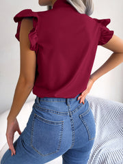 Burgundy ruffled sleeve pussybow blouse with high neckline.