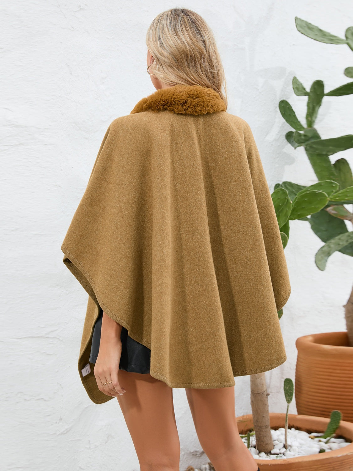 Camel faux fur collar wrap poncho with a relaxed fit.
