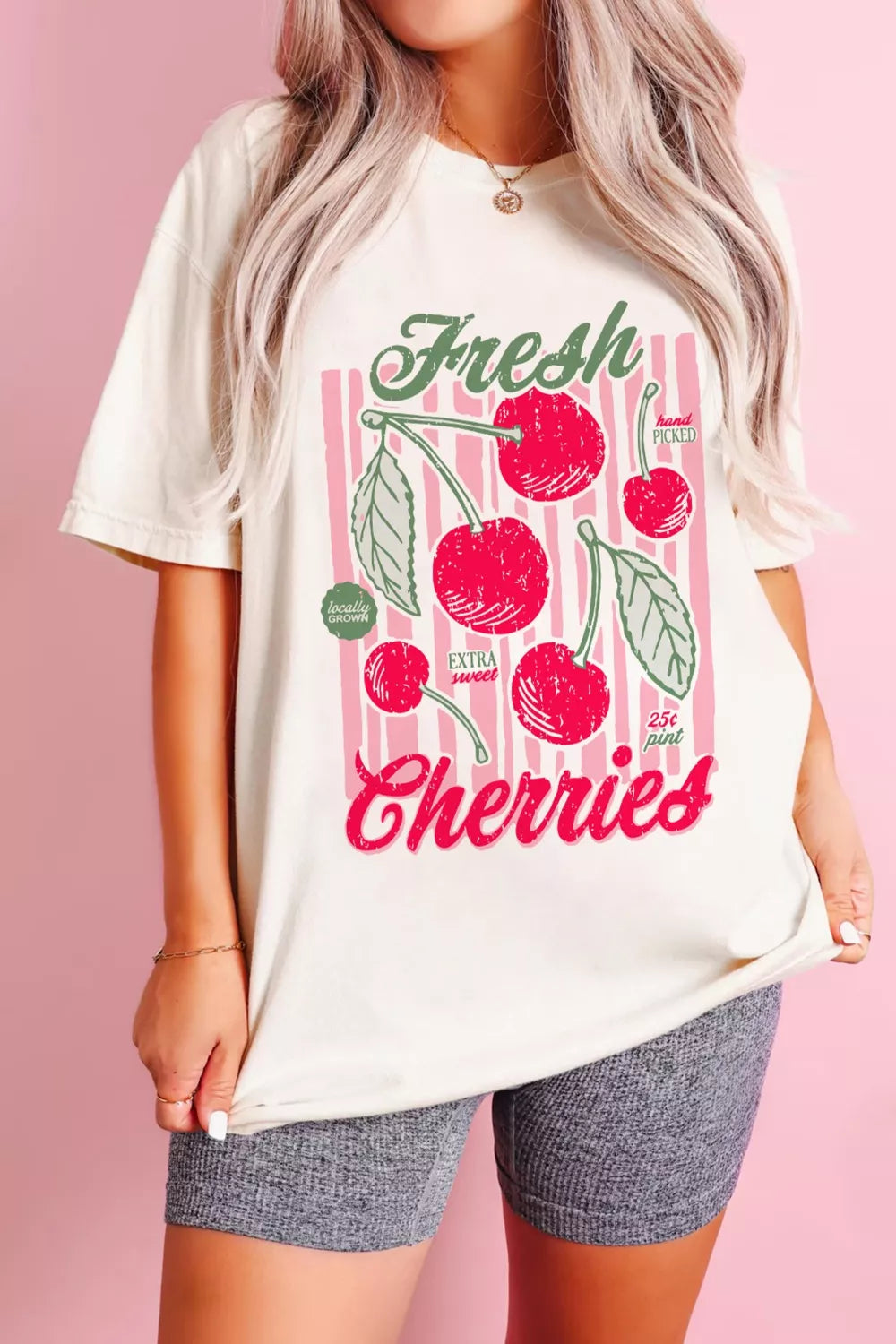 Cream oversized tee with vintage cherry graphic and pink stripes