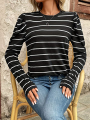 Black and white striped long sleeve top with gathered puff sleeves.