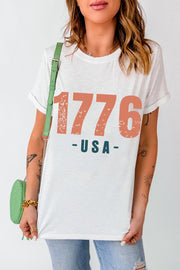 White t-shirt with distressed 1776 USA graphic, crew neck, short sleeves.