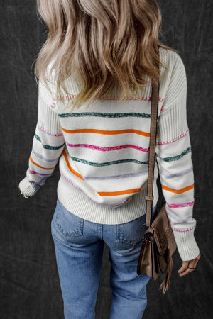 White ribbed knit pullover sweater with rainbow stripes and crew neck