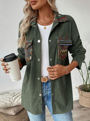 Army green corduroy overshirt with embroidered statement pockets and collar detail.
