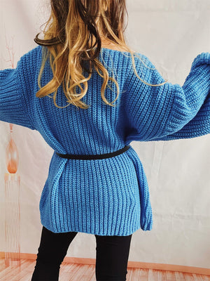 Sky blue ribbed knit sweater with belted waist and oversized sleeves.