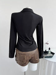Black long sleeve button-down maternity shirt with lace trim and V-neck