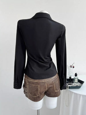 Black long sleeve button-down maternity shirt with lace trim and V-neck