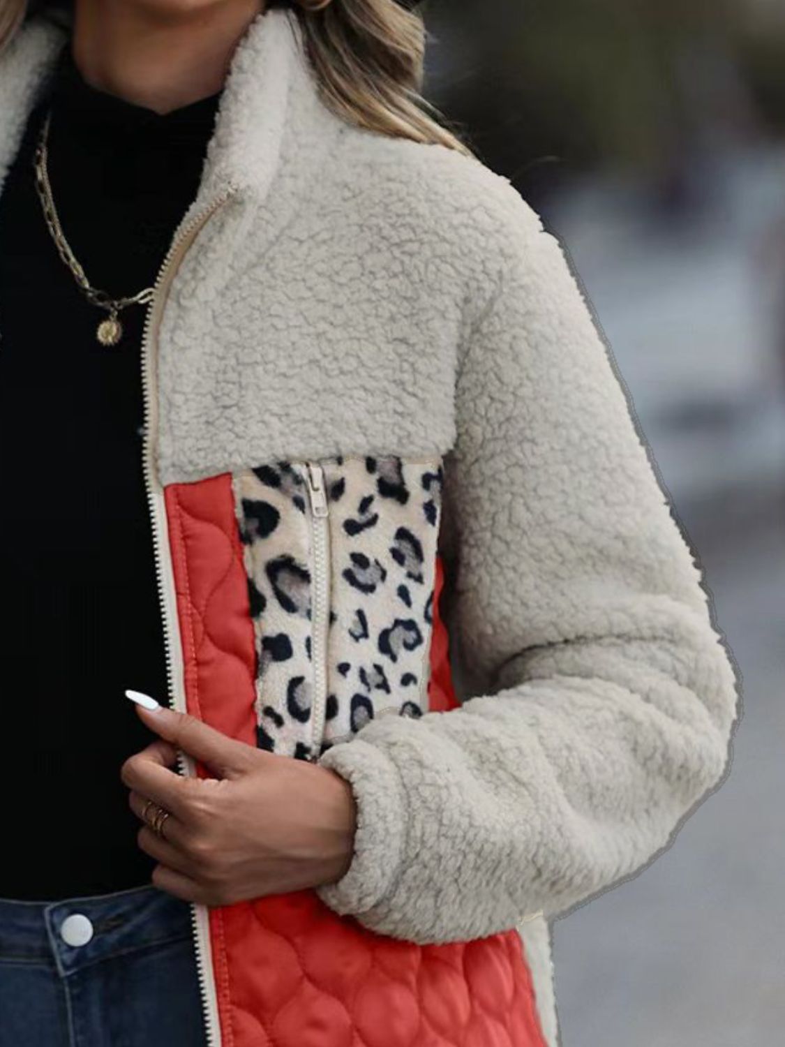 Teddy & quilted panel zip jacket in cream with leopard print and red accents.