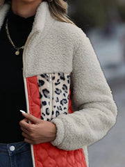 Teddy & quilted panel zip jacket in cream with leopard print and red accents.