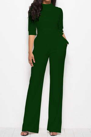 Dark green high-neck belted palazzo jumpsuit with 3/4 sleeves and wide legs.