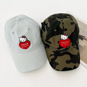 Hello Kitty embroidered cotton baseball caps in light and army green camouflage.