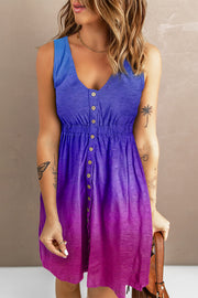 Sundress with button front and elastic waist in a blue to purple ombre.
