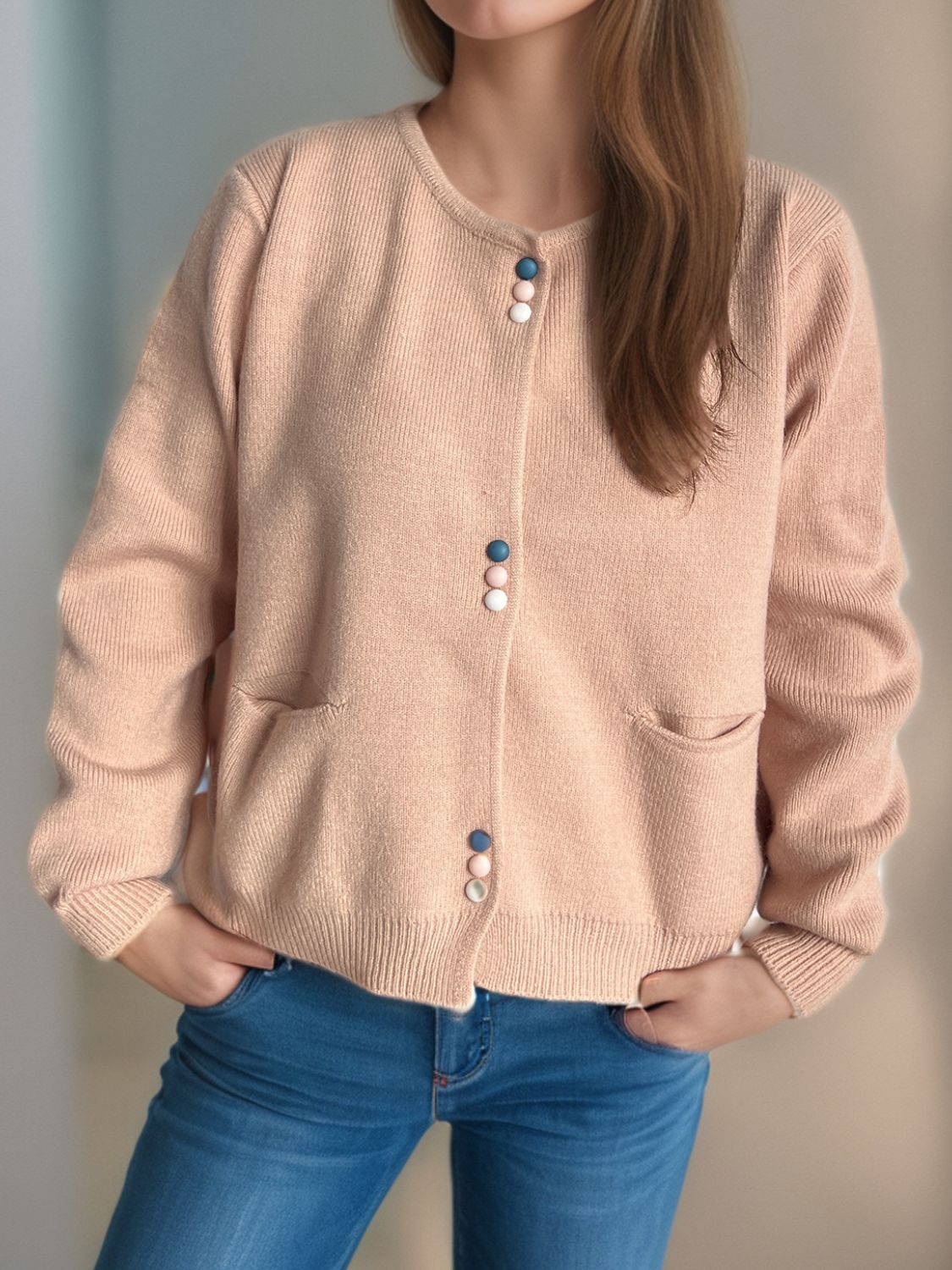 Dusty Pink ribbed knit button-up cardigan with playful pastel buttons and front pockets.