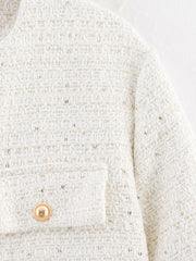 White tweed bolero jacket with gold sequins and button pocket detail