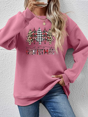 Blush pink crewneck sweatshirt with Christmas trees graphic and buffalo plaid accents.