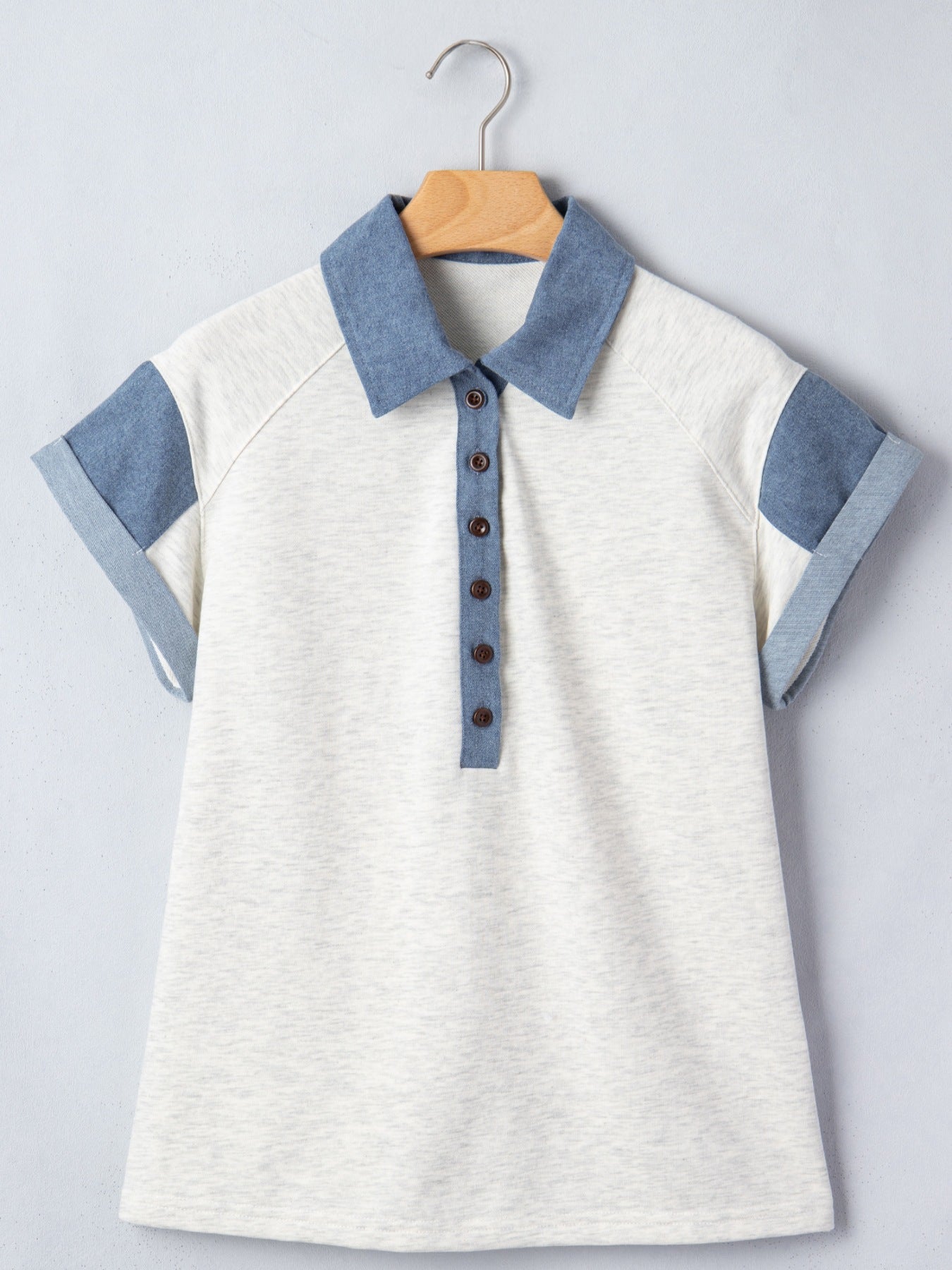Button detail casual polo top in heather grey with denim collar and sleeve accents.