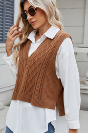 Caramel cable knit diamond pattern sweater vest with V-neck and side slits.