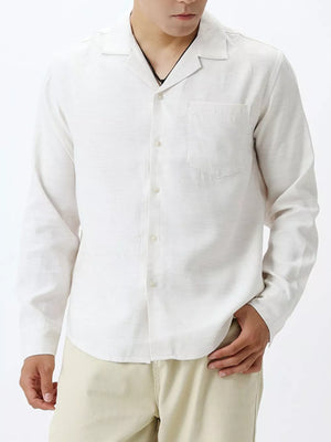 White relaxed camp collar button-up shirt with chest pocket