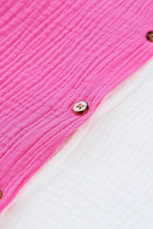 Chic color block cotton shirt with button detail and textured fabric.