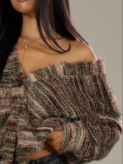 Cozy textured knit cardigan in a multi-color blend with buttons and fuzzy trim.